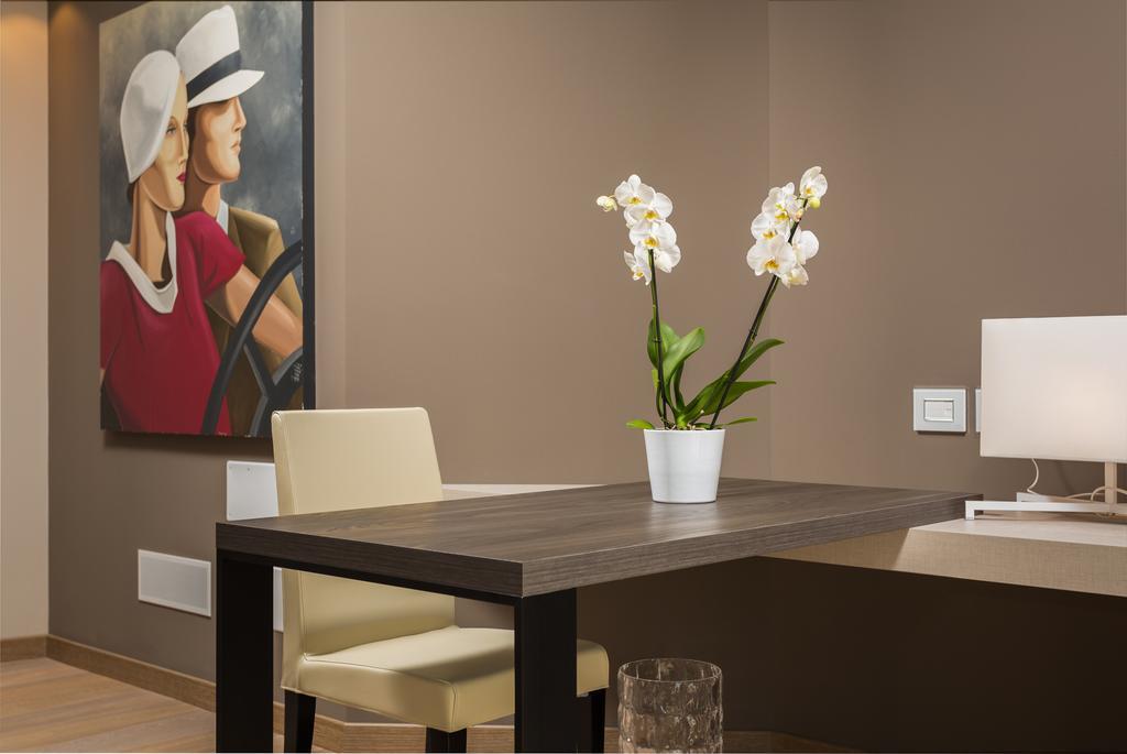 Suites Hotel Astor Belluno Ruang foto
