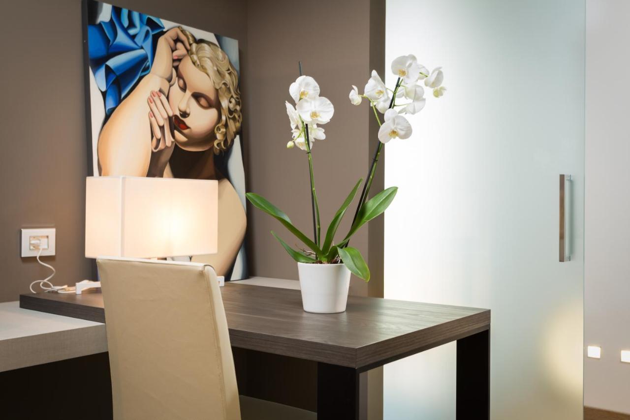Suites Hotel Astor Belluno Bagian luar foto