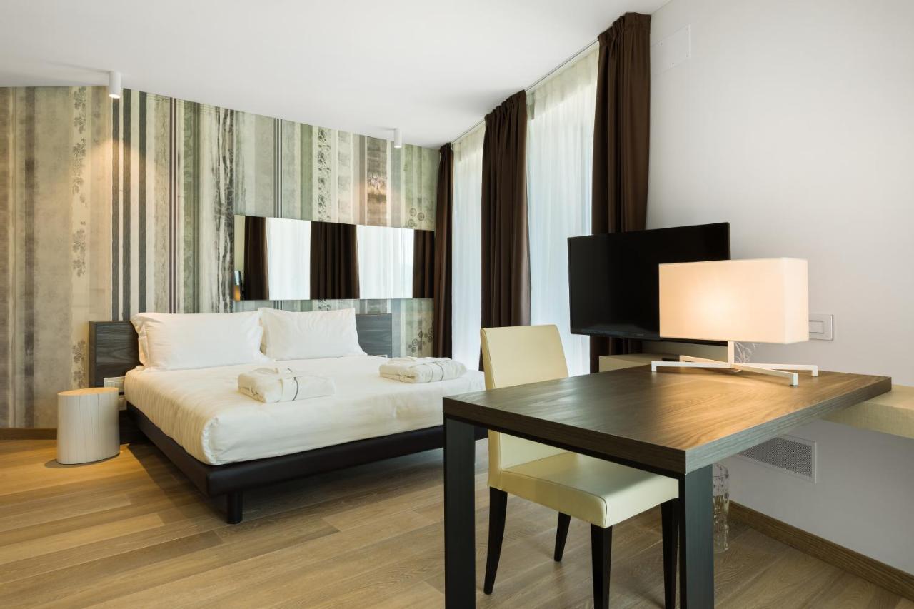 Suites Hotel Astor Belluno Bagian luar foto